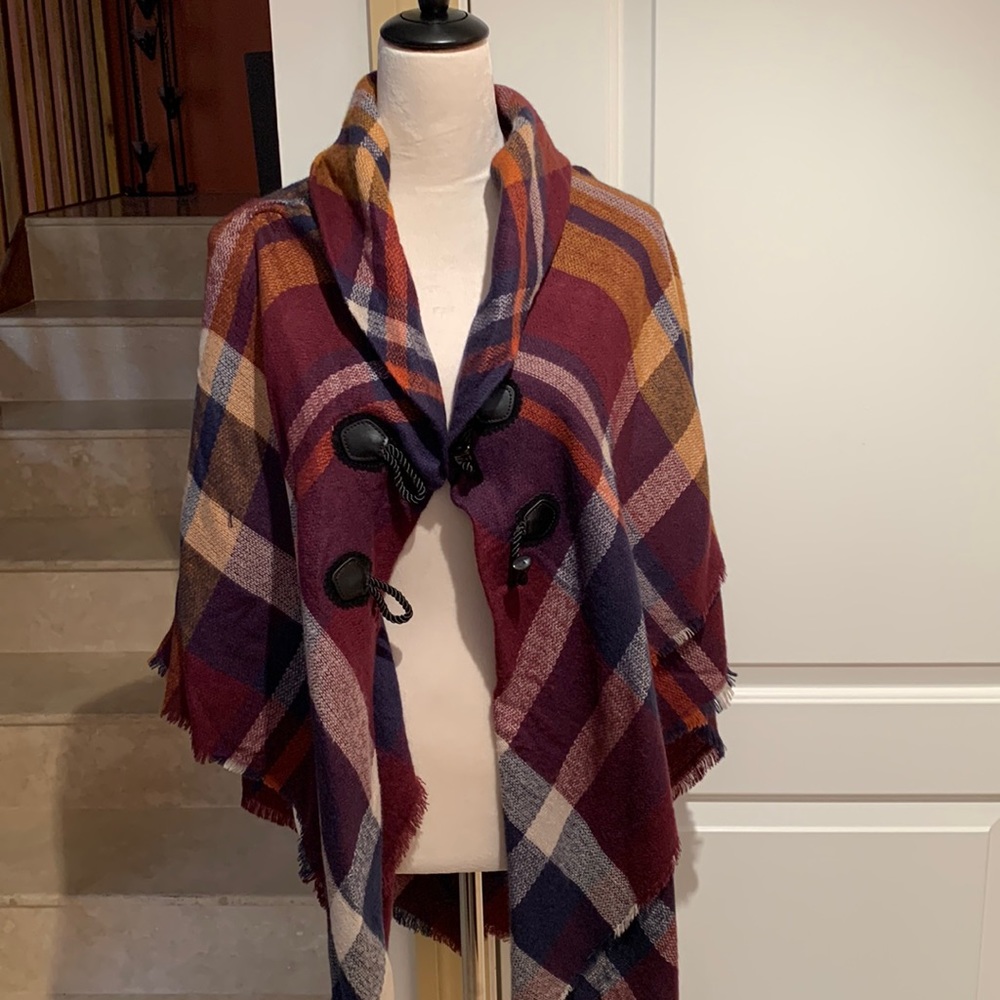 MIXIT. One size shawl/ wrap with toggle closure in front.